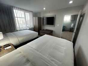 Kamar Tidur 4 MainStay Suites