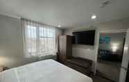 Kamar Tidur 4 MainStay Suites