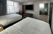 Kamar Tidur 6 MainStay Suites