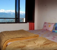 Bedroom 3 Goroomgo Stay Inn Kausani