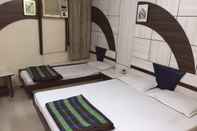 Bedroom Goroomgo The eden - Travellers  Indore