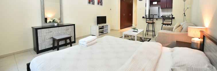 ห้องนอน KEN - Spectacular Furnished Studio