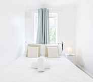 Kamar Tidur 7 Charming 3-bed Apartment in Romford