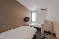 Kamar Tidur HOTEL R9 The Yard Inabe