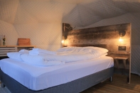 Bedroom Enjoy Lofoten Glamping