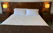 Kamar Tidur 4 The Branson Welcome Inn - Country Blvd