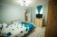 Bedroom Stunning 5 Bed House in Campulung Moldovenesc