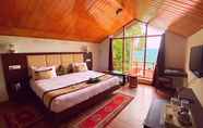 Bedroom 7 The Rumtek Cottages by ShriGo Hotels