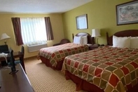 Bedroom American Heritage Inn