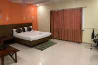 Bedroom Hotel KP Suites