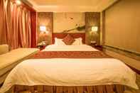 Kamar Tidur Jinguan Holiday Hotel