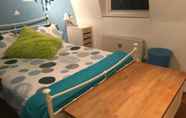 Bedroom 4 Cheerful 4 Bedroom Home in the Heart of London