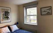 Bedroom 3 Cheerful 4 Bedroom Home in the Heart of London