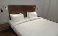 Kamar Tidur 4 Golden Frame Hotel