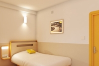 Kamar Tidur Bloom Hotel - Brookefield