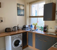 Bedroom 5 Homely 2-bed Apartment in Combe Martin