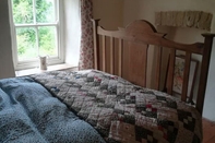 Bedroom Cosy & Traditional Cottage in Rhandirmwyn