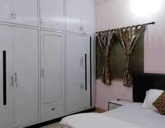 Kamar Tidur 2 Goroomgo Laughing Buddha  Bhubaneswar