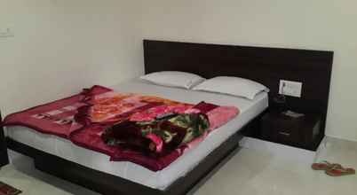 Kamar Tidur 4 Goroomgo Vasu Jabalpur