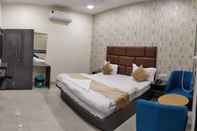 Kamar Tidur Goroomgo Mandakini Royale Kanpur