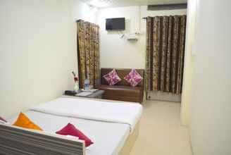 Kamar Tidur 4 Goroomgo Dhingra Residency Jabalpur