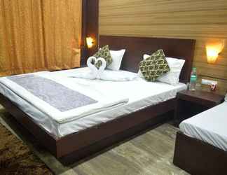 Bedroom 2 Goroomgo Dhingra Residency Jabalpur