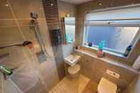 In-room Bathroom Captivating 2 Bedroom Bungalow in Mumbles