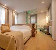 Phòng ngủ 5 Le Cappuccinelle Suites&SPA