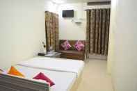 Bedroom Goroomgo Satyam Residency Jabalpur