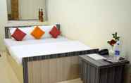 Bedroom 4 Goroomgo Satyam Residency Jabalpur