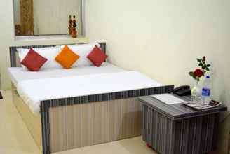 Bedroom 4 Goroomgo Satyam Residency Jabalpur