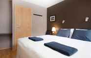 Kamar Tidur 4 Torg Guest House