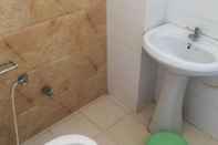 Phòng tắm bên trong Goroomgo Polo Inn Jodhpur