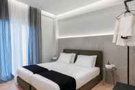 Kamar Tidur Acropolis White Key Residence