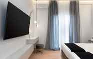 Kamar Tidur 5 Acropolis White Key Residence