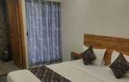 Bedroom 7 Hotel Fun Imperial Morbi