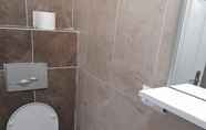 In-room Bathroom 6 İlyada Pansiyon