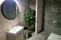 In-room Bathroom Wellness Apartments