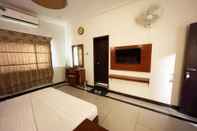 ห้องนอน The Grand Hotel Multan