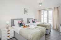 Kamar Tidur Bright and Cozy 2-bed Apartment in Dagenham