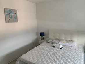 Bedroom 4 Caslano City Aparments
