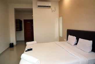 Kamar Tidur 4 Hotel Krushna Express Inn