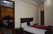 Kamar Tidur 6 Hotel Travel Inn