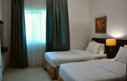 Kamar Tidur 7 CARE Holiday Homes Apartments Barsha Heights