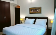 Bilik Tidur 3 CARE Holiday Homes Apartments Barsha Heights