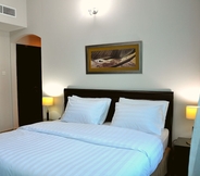 Bedroom 3 CARE Holiday Homes Apartments Barsha Heights