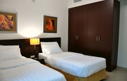 Kamar Tidur 4 CARE Holiday Homes Apartments Barsha Heights