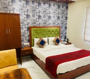 Kamar Tidur 3 Hotel SV Grand Varanasi