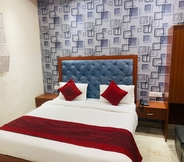 Kamar Tidur 2 Hotel SV Grand Varanasi