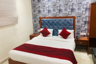 Kamar Tidur Hotel SV Grand Varanasi